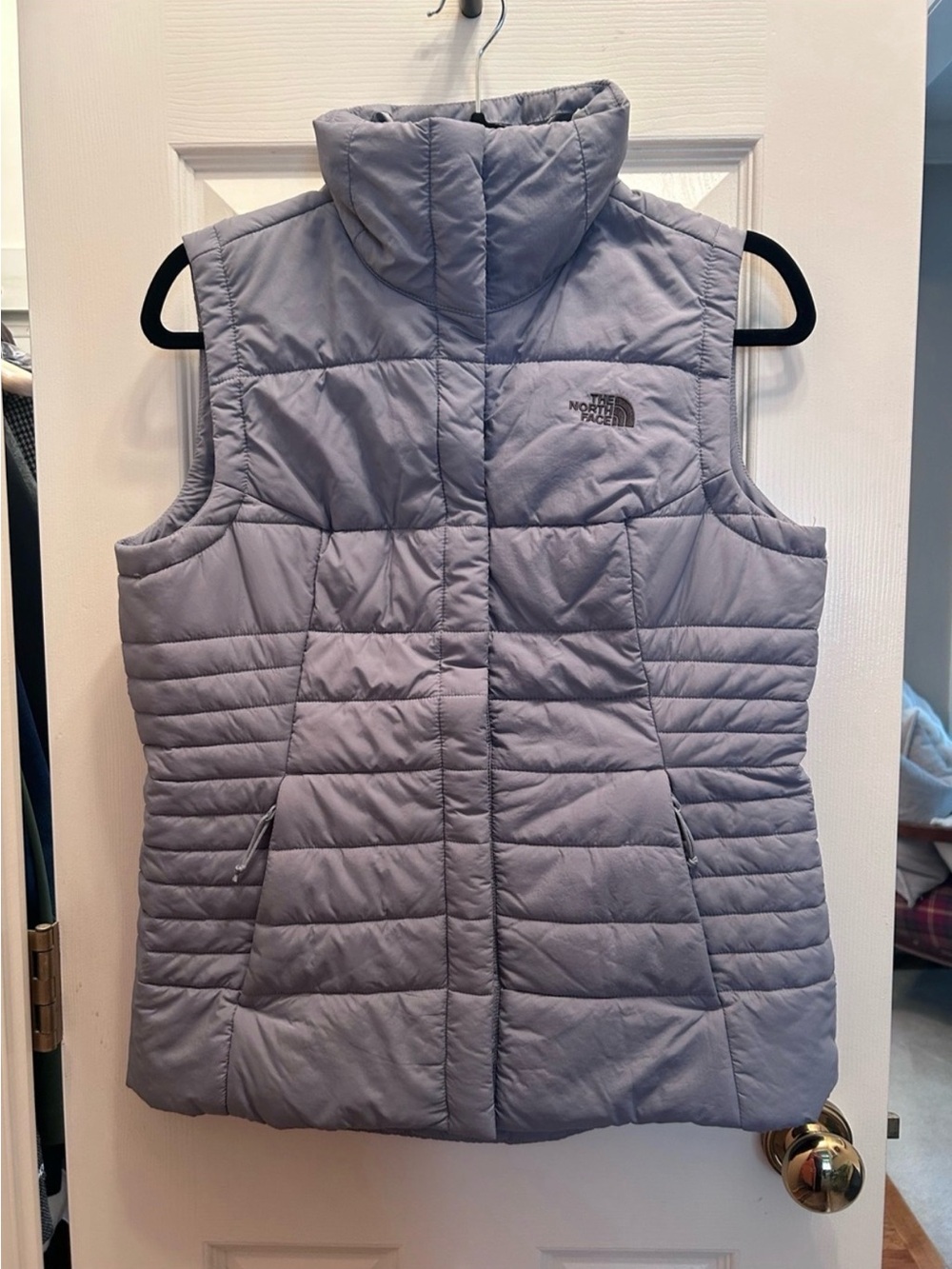 The North Face Light Gray Puffer Vest with Zipper Pockets. Size M.